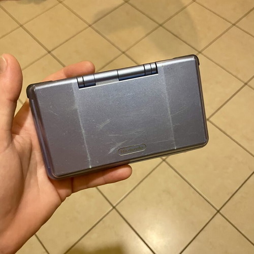 Nintendo DS Fat console with charger and stylus