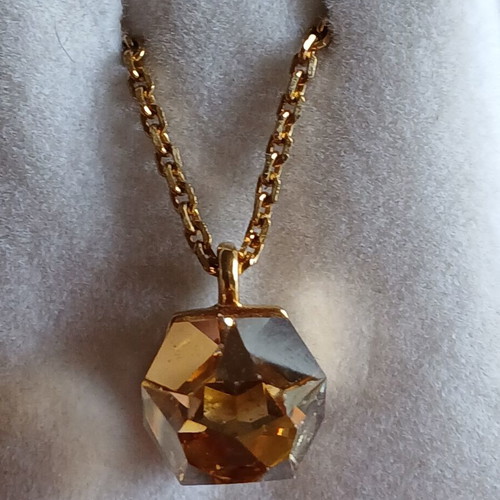 Swarovski necklace and bracelet set like new, gold color