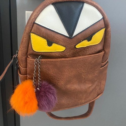 Monster Eyes backpack new leather 24x21 with pom-poms