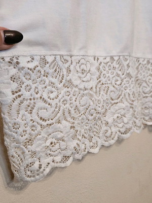 White Sleeveless Blouse