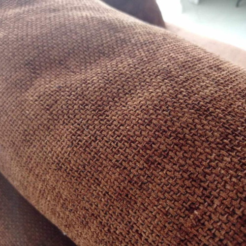 Two-seater sofa used, warm brown color, removable cushion covers