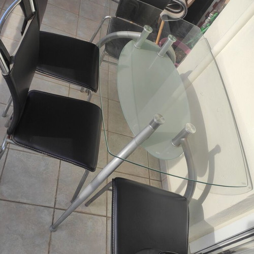 Dining set with 4 chairs used, glass top