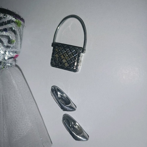 Barbie clothing set used with silver accessories