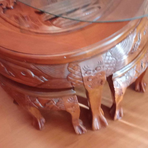 Coffee table with 6 small carved handmade stools like new, oval glass top