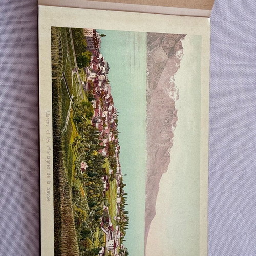 Leather-bound book with used Swiss Geneva postcard images