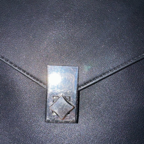 KEM black backpack bag like new with minor scratches on clasp