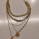 Feaux necklace like new, gold-colored