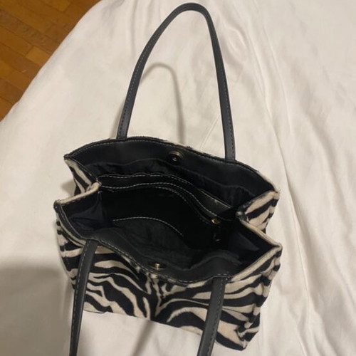 Thiros shoulder bag like new, animal print black and white