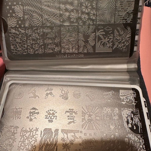 Nail stamps like new, set of 19 with case