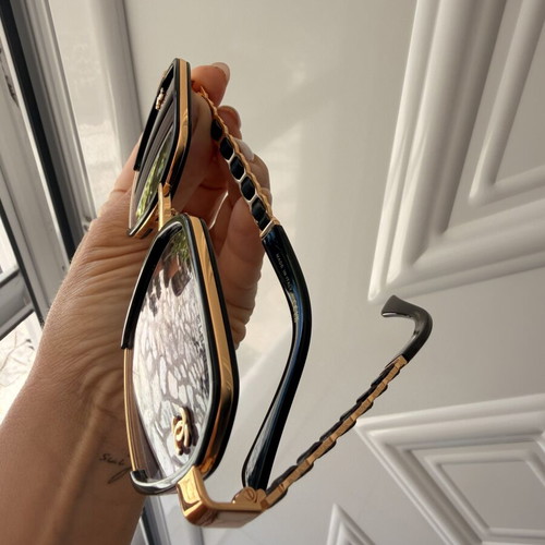 Chanel women's sunglasses black and gold, new model
