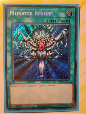 Monster Reborn Yu-Gi-Oh! card like new with Ultra Pro protective sleeve