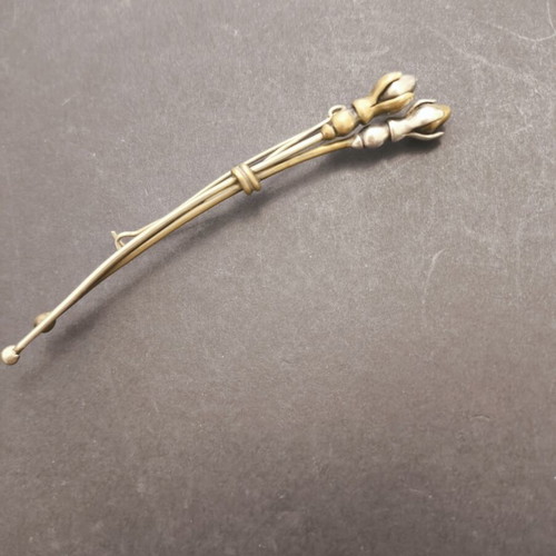 Brooch with silver and bronze details
