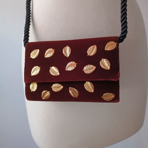 Small brown crossbody bag with gold metallic leaves used