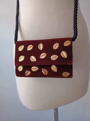Small brown crossbody bag with gold metallic leaves used