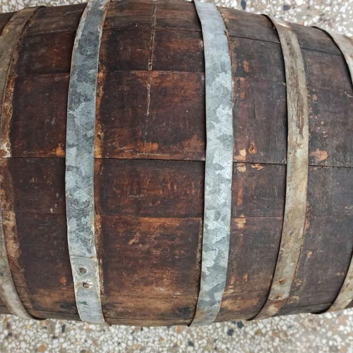 Old oak barrel used with cork stopper and plastic spigot