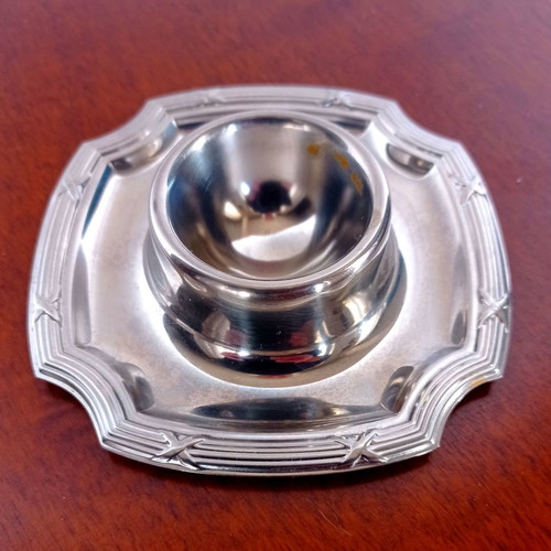 Metal egg holder used, silver color