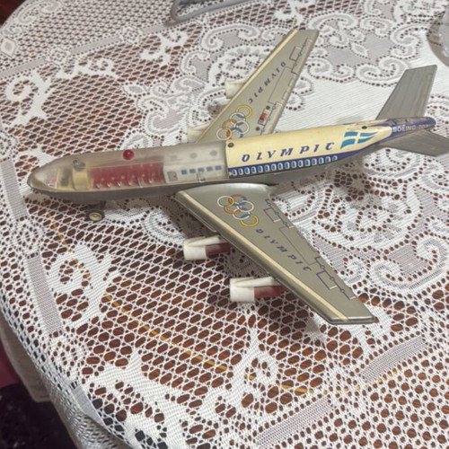 Olympic Boeing 707 model airplane used collectible