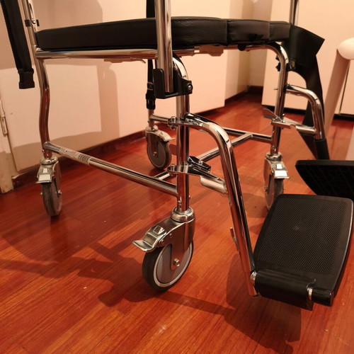 Chair for elderly used with wheels and belt