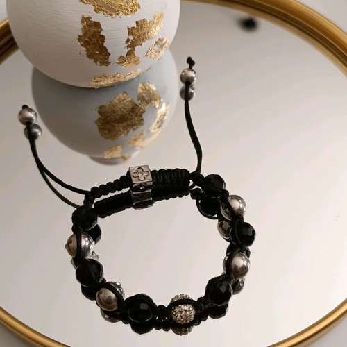 Macramé bracelet with crystals and metal beads