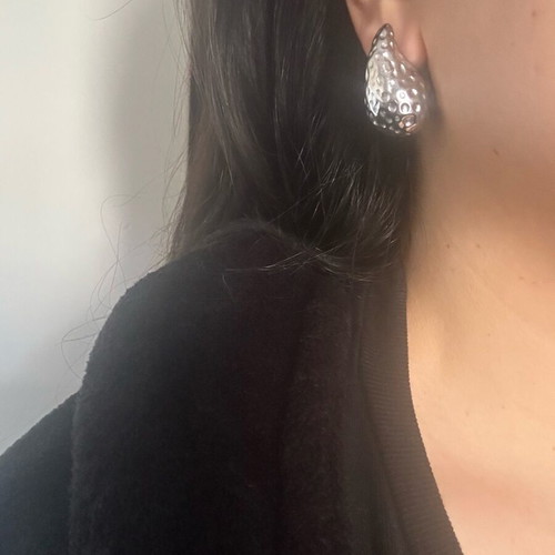 Earrings new, finely carved steel