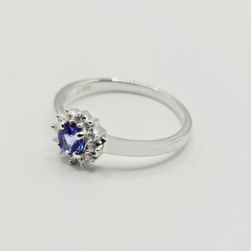 Ring with natural tanzanite new, rhodium plated
