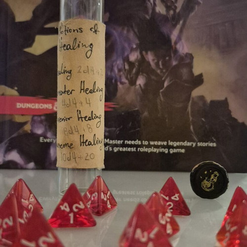 Dnd healing potion with 10 red tetrahedral dice in bottle