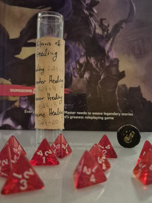 Dnd healing potion with 10 red tetrahedral dice in bottle