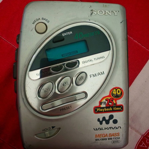 Sony Walkman wm-fx244 used with FM radio and headphones