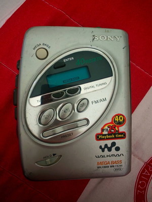 Sony Walkman wm-fx244 used with FM radio and headphones