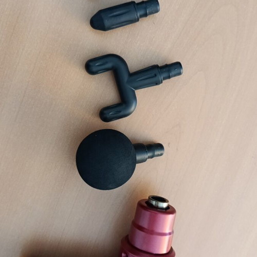 Massage gun new with four attachments and six speeds