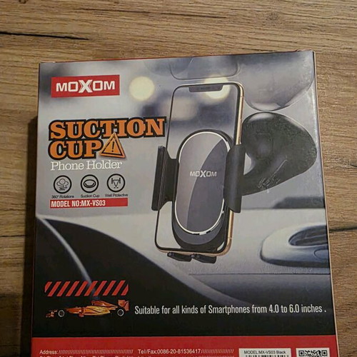 Suction cup phone holder for smartphones up to 6 inches