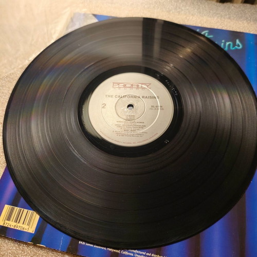 The California Raisins Sing The Hit Songs LP vinyl 1987