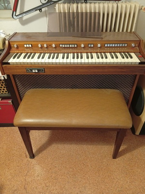 Harmonium with seat