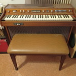 Harmonium with seat