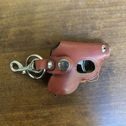 Gun-shaped lighter with case
