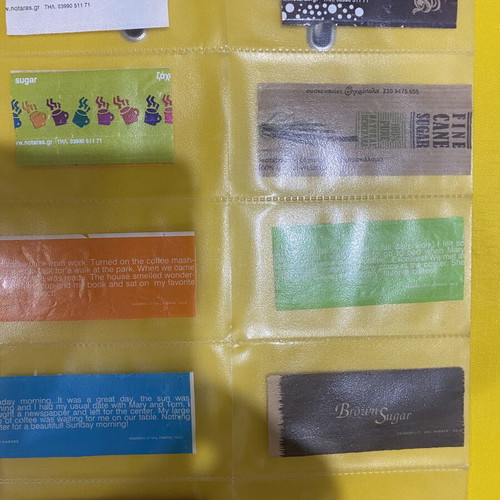 Sugar packet collection, 69 in holders plus 5 loose