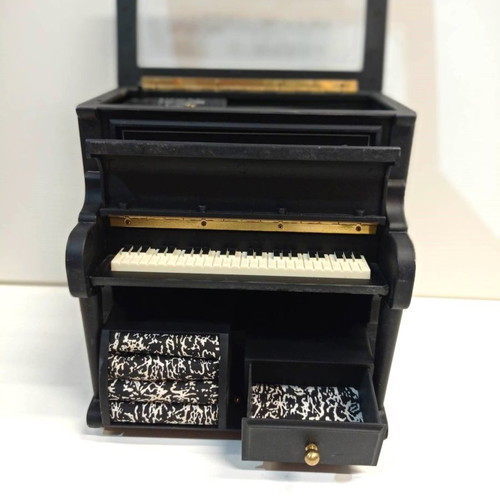 Decorative piano music box used from the 1970s with jewelry storage
