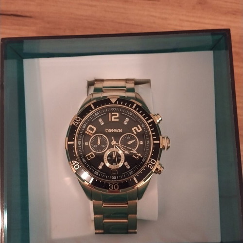 Breeze women's watch like new, gold color