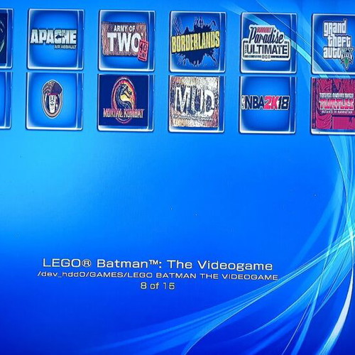 PS3 Slim CECH-2004B console like new with DualShock 3 and 14 games