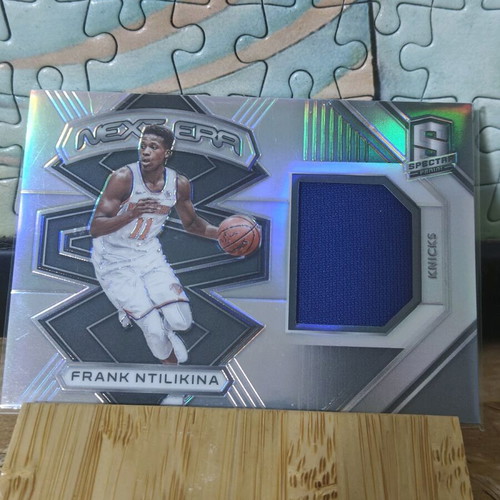 Frank Ntilikina Spectra Collectible Card with Worn Jersey Piece like new