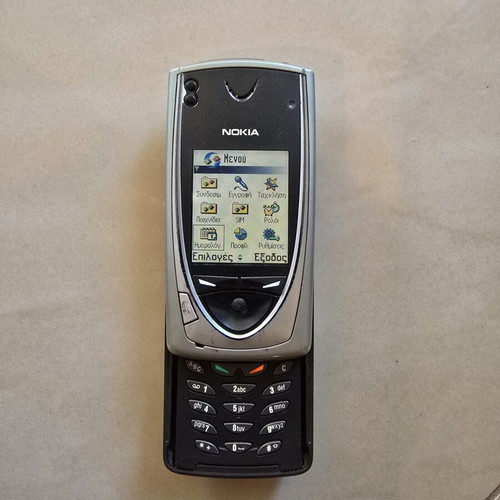 Nokia 7650 cell phone used, silver