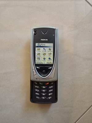 Nokia 7650 cell phone used, silver