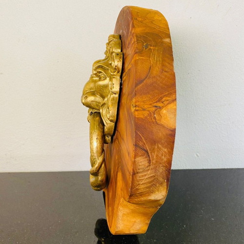 Bronze door knocker used with lion head and wooden base