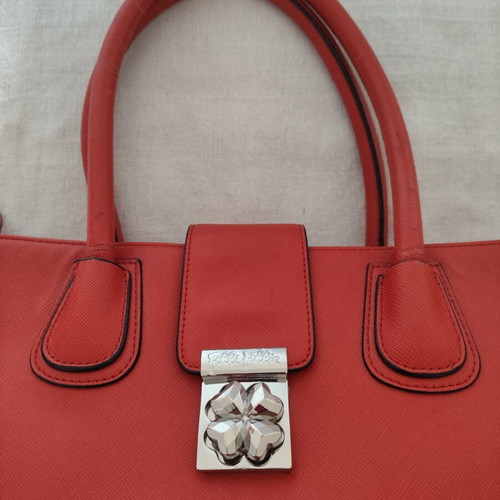Folli Follie Ladies Handbag used, burnt orange with flower fastening
