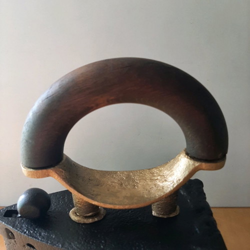 Charcoal iron used from 1920-30 with thorough restoration