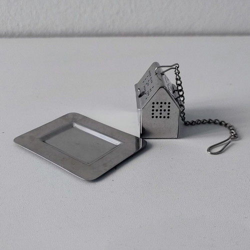 Vintage stainless steel tea infuser house with base and chain like new