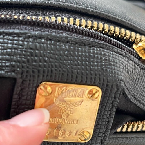 MCM black handbag with gold metal like new