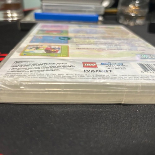 PC games lot of 3 used with two sealed Lego titles