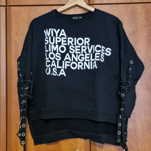 Black sweatshirt used with unique sleeves and asymmetrical design