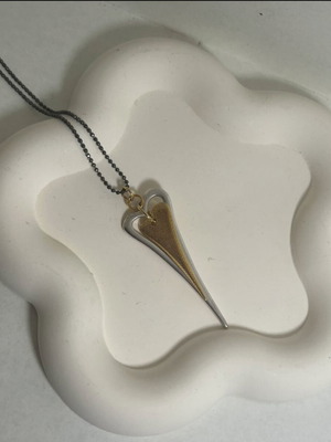 Long heart necklace like new, gold and silver colors